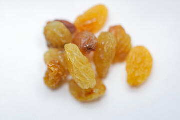 Fototapeta premium Raisins close up photo with white background, Kismis