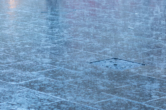 Heavy rain on asphalt