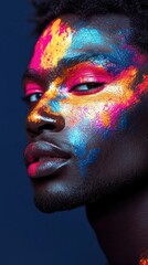 Vibrant Painted Portrait of an African-American Model with Colorful Abstract Face Art on Dark Background
