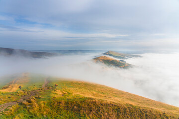 Mam Tor in Peak District with morning clouds in the valley. United Kingdom. England