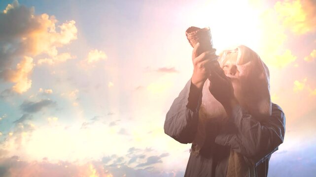 Jewish man blowing the Shofar horn of Rosh Hashanah New Year