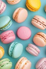 Obraz premium Colorful macarons in various flavors displayed beautifully on a light background