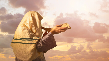 Jewish man blowing the Shofar horn of Rosh Hashanah New Year