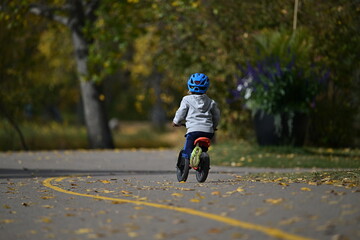 Fototapeta premium child riding a bike