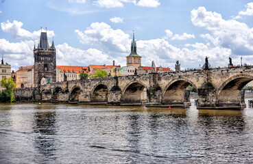 Prague, Czech Republic - July 19, 2024: Morning views along the Vltava River and Charles Bridge n Prague in the Czech Republic
