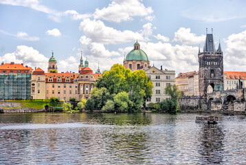 Prague, Czech Republic - July 19, 2024: Morning views along the Vltava River and Charles Bridge n Prague in the Czech Republic
