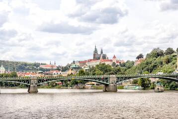 Prague, Czech Republic - July 19, 2024: Morning views along the Vltava River and Charles Bridge n...