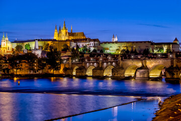 Prague, Czech Republic - July 16, 2024: Nighttime views of the Charles Bridge, Prague Castle and surrounding streets in Prague in the Czech Republic
