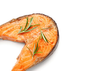 Tasty fried salmon steak with rosemary on white background