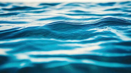 Close-up of rippling blue water surface with a shallow depth of field.