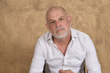 Obraz premium portrait business man with bald white beard facial expression feeling pain fashion image model isolated on white transparent background man