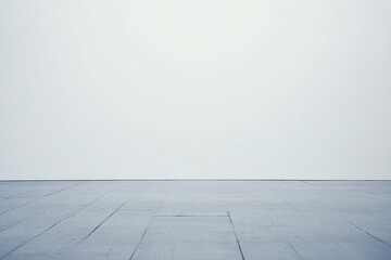 Fototapeta premium A clean and minimalist interior space featuring a plain white wall and a smooth floor creating a sense of openness and simplicity