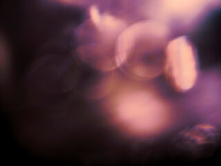 Colorful light leak on dark background. Cinematic visual lens effect for design and creative ideas....