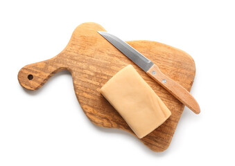 Wooden board with marzipan bar and knife on white background