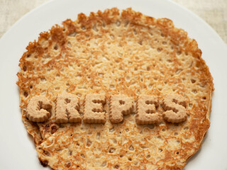 Sign crepes on top of the product. Popular simple multi national food known for its taste and flavoring options.
