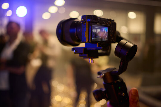 A Professional Camera Stabilizer utilized at a thriving Event setting for capturing stunning visuals