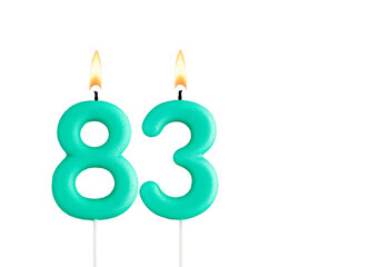 Birthday number 83 - Green birthday candle on white background
