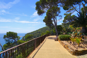 beautiful path at the Mediterranean Sea in the botanical garden Jardins de Cap Roig, Calella de Palafrugell, Costa Brava, Girona, Catalonia, Spain