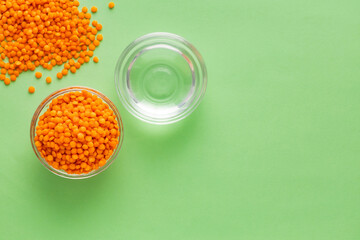 Lens culinaris - Red lentils and water in the bowl.