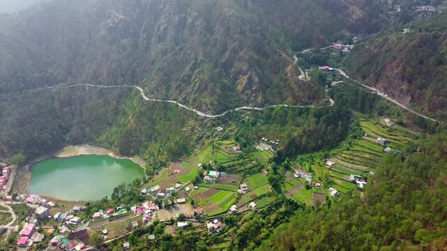 Aerial view of khurpatal lake in smanora range. A beautiful image of khurpatal lake and houses in uttarakhand in India.