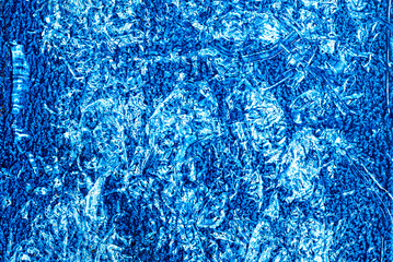 abstract background with the organic texture of raw lapis lazuli gemstones