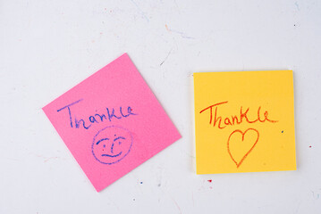 Diverse 'Thank You' post-it notes mosaic with vibrant colors