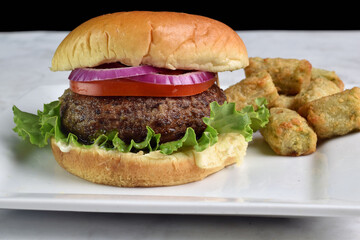 mushroom burger with onions and tomatoes