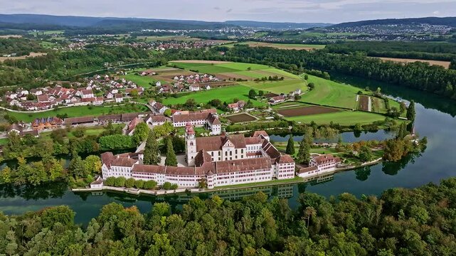 Aerial view of the former Benedictine abbey with the monastery church of St Mary and the pointed church of St Magdalena on the Rhine island of Rheinau, Andelfingen, Canton Zurich, Switzerland, Europe