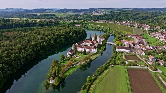 Aerial view of the former Benedictine abbey with the monastery church of St Mary and the pointed church of St Magdalena on the Rhine island of Rheinau, Andelfingen, Canton Zurich, Switzerland, Europe