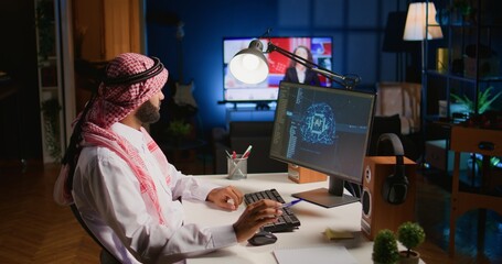Trained arabic technician updating neural networks, writing intricate binary code scripts on computer. Middle Eastern man uses digital device programming to upgrade AI with TV as background noise