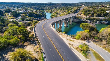 Obraz premium Scenic Bridge Over a Lake in a Lush, Verdant Landscape