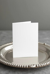 Empty card on silver tray. Created using AI.