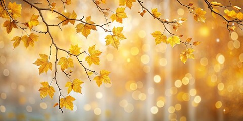 Golden autumn leaves on a branch against a blurred background of warm yellow bokeh lights.
