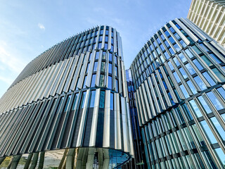 Prague, Czech Republic - July 19, 2024: Morning views of modern office towers and residential...