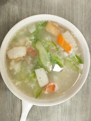 bitter gourd soup served in a white bowl