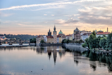 Prague, Czech Republic - July 19, 2024: Early morning views of the Vltava River and the Charles...