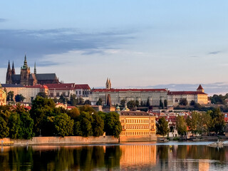 Obraz premium Prague, Czech Republic - July 19, 2024: Early morning views of the Vltava River and the Charles Bridge in Prague in the Czech Republic 
