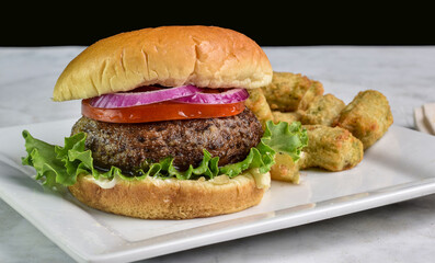 portobello burger  serve with  broccoli tots