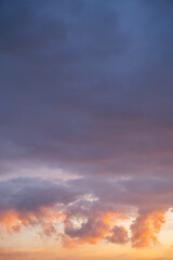 Beautiful sunset sky with vibrant colors and scattered clouds.