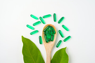 Softgels green, supplements, fish oil, omega 3, vitamin D3, vitamin E oil filled capsules