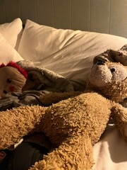 Teddy bear on bed