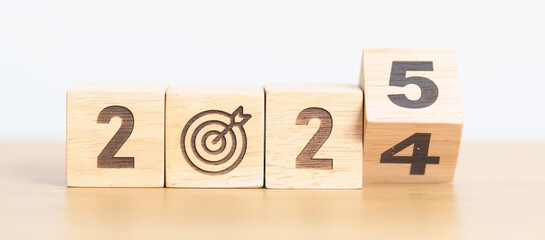 2024 year change to 2025 year block with dartboard icon. Goal, Target, Resolution, strategy, plan,...