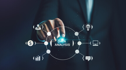 A businessman interacts with a futuristic interface for Data Analysis, showcasing the role of advanced analytics in strategic decision-making and business optimization.