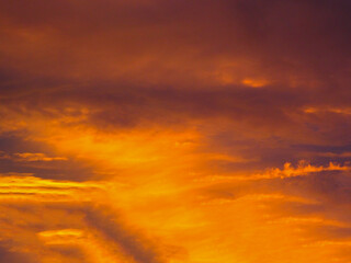 dreamy and colourful sunset in the soft clouds on a relaxing evening