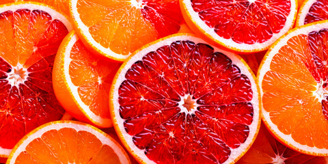 Close Up of Red and Orange Citrus Slices.