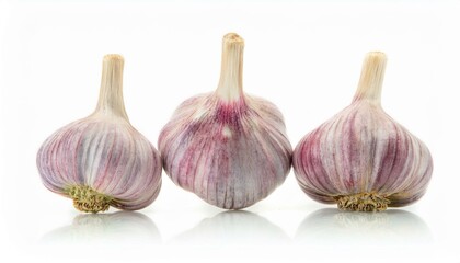 Garlic bulbs isolated on white background. Clipping path. Whole garlic. Ideal for illustrating culinary, health, and healthy lifestyle themes.
