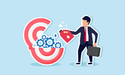 A businessman lubricates the gears of a target board, an illustration of the need to upgrade or maintain targets to stay focused on set objectives.