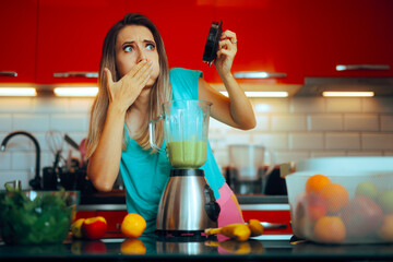 Woman feeling Disgusted with a Healthy Green Smoothie. Person feeling nauseated from the bad smell...