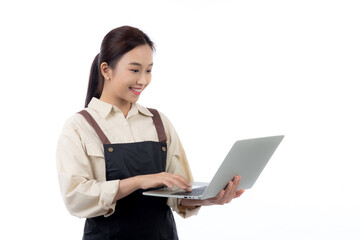 Portrait young asian business woman wearing apron holding laptop computer isolated white background, waitress or barista holding laptop computer with confident, cut out, business or freelance.