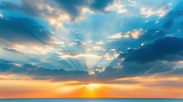 Stunning sunset sky over tranquil sea with dark clouds and sunrays. Mesmerizing cloudscape nature backdrop.
